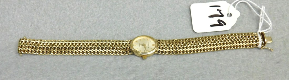 14K y.g. "Croton" Lady's Wristwatch: 14K y.g. "Croton" Lady's Wristwatch, Both Watch & Band are Gold, Quartz in VG Cond. Working