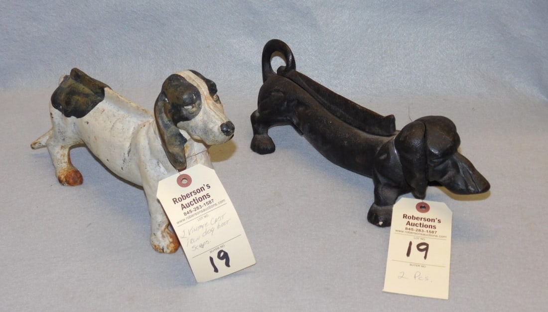 2 Iron Dog Bootscrapers: 2 Iron Dog Bootscrapers Incl. Black Dachshund & Wht. & Black Dachshund in GD Cond. , some rust and paint loss