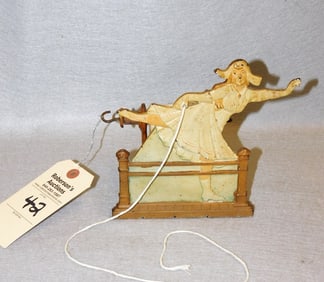 Figural  Iron Skater String Dispenser