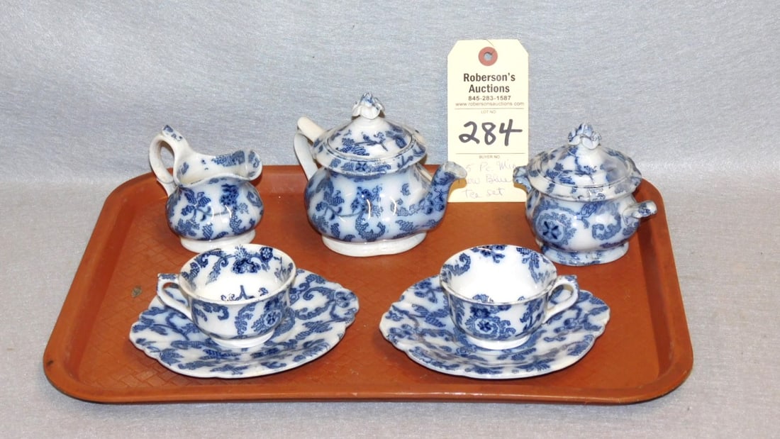 5 Pc. Miniature Flow Blue Tea Set: 5 Pc. Miniature Flow Blue Tea Set in VG Cond, 4 1/2"H. Teapot, 4"H. Sugar, 3 1/2"H.Pitcher