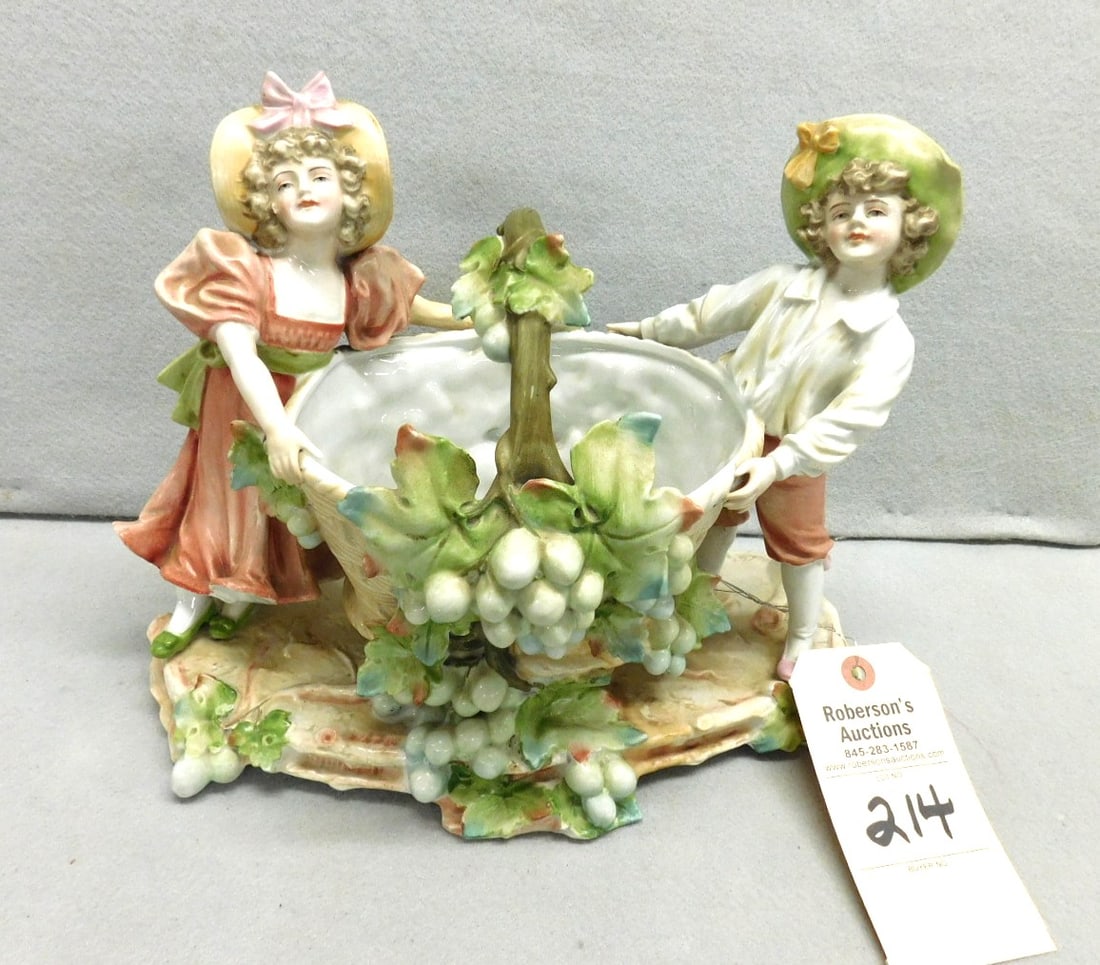 Very Fancy Bisque Figural: Very Fancy Bisque Figural w/ Ctr. Bowl w/ Grape Clusters & Boy & Girl Figures on Ea. Side in VG Cond. - 13"W x 9"H x 6"D