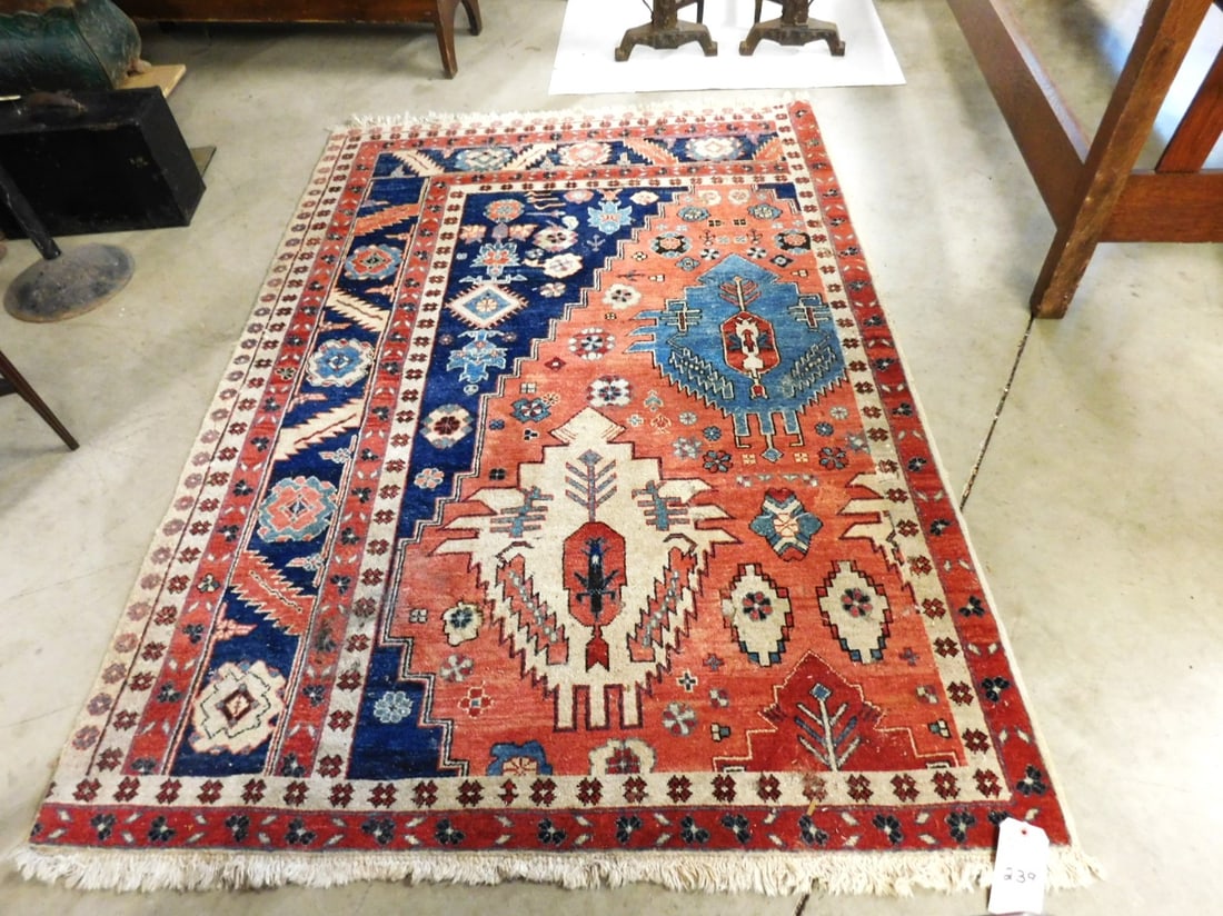 84" x 58" Oriental Rug: 84" x 58" Oriental Rug w/ Unusual 2 Sided Border in Blues/Reds in Fair Cond. (Moth Holes) Buying as is