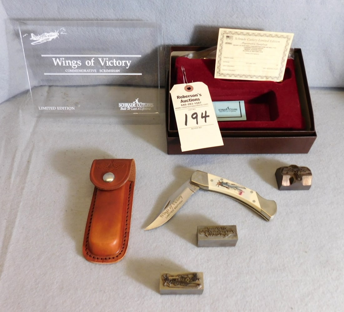 2 Boxed Schrade Scrimshaw Knives: 2 Boxed Schrade Scrimshaw Knives w/ Sheaths & Original Hotstamps- "Wings of Victory" & "Breaking the Sound Barrier" in GD Cond. - Boxes 6 1/4"D x 9"W x 2 1/2"H.
