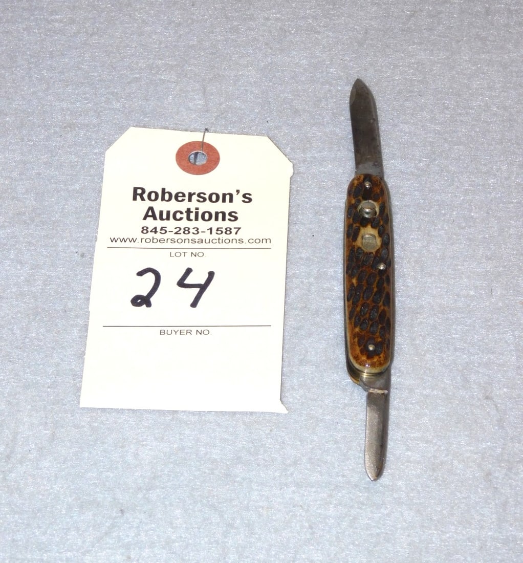 Remington 2 Blade Automatic Knife: Remington 2 Blade Automatic Knife w/Jig Bone Hdls. - 1 Small Crack at Center Pin on Pile Side, Made by George Schrade Knife Co., Some Etch Still Present - 3 3/8in. in VG Cond.