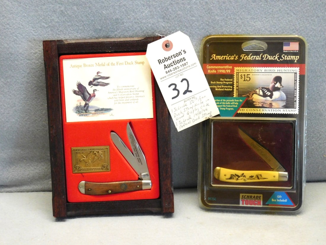 2 - Duck Stamp Knife Display Cases: 2 - Duck Stamp Knife Display Cases : 1 - Schrade 50th Anniversary of the Federal Duck Stamp Knife in Wooden Display Case; 1 - Schrade 1998/99 Federal Duck Stamp Knife in Orig. Store Packaging - Cases
