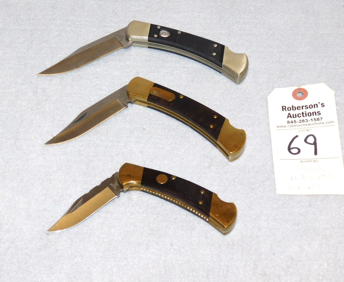 3 - Buck Automatic Knives: 3 - Buck Automatic Knives: 1 - 110 Conversion w/Wood Handles; 1 - 112 Conversion w/Filework & Wood Handles; 1 - 110 Factory Auto Block Handles in VG Cond. - 4 1/4"; 2 - 5"