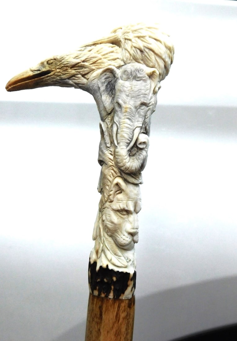 Custom Made Carved Walking Cane: Custom Made Outstanding Walking Cane w/Carved Stag Horn Handle Depicting Eagle, Birds, Elephant, Bear, Wolves, Lion in Exel. Cond. - 36 1/2" top to btm. - Head Only 5 1/2"H.x 1 1/4W.