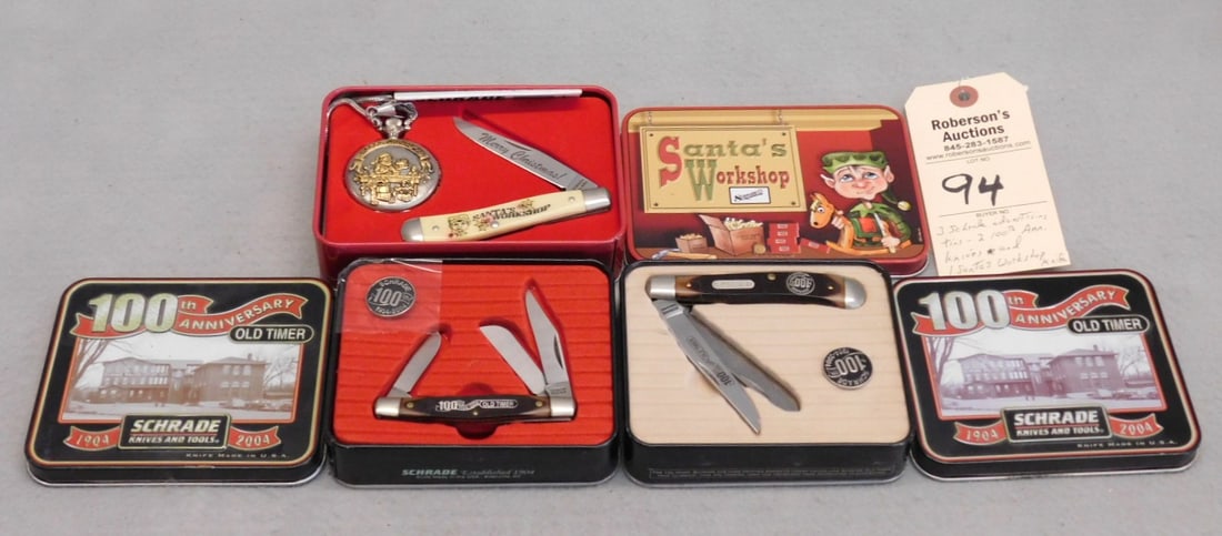 3 - Schrade Advertising Tins w/Knives: 3 - Schrade Advertising Tins w/Knives Incl. 2 - 100th Anniversary Knives & 1 Santa Work Shop in VG Cond. - Tin Cases - 4 1/2x4x1 3/8; Knives Range from 3 1/2 to 3 7/8"