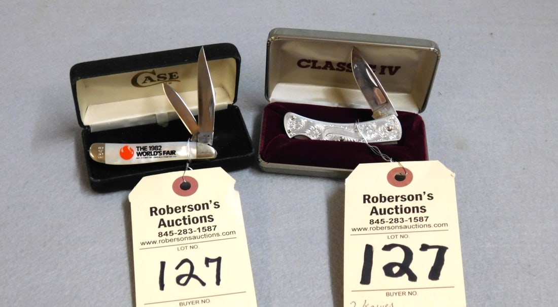 2 Cased Knives - Buck & World's Fair: 2 Cased Knives: 1 - Engraved Buck 515 Knife; 1 - Pearl Case 8220, 1982 Worlds Fair, Both Cases 4 x 2 x 1", Knives 3" Ea., VG Condition