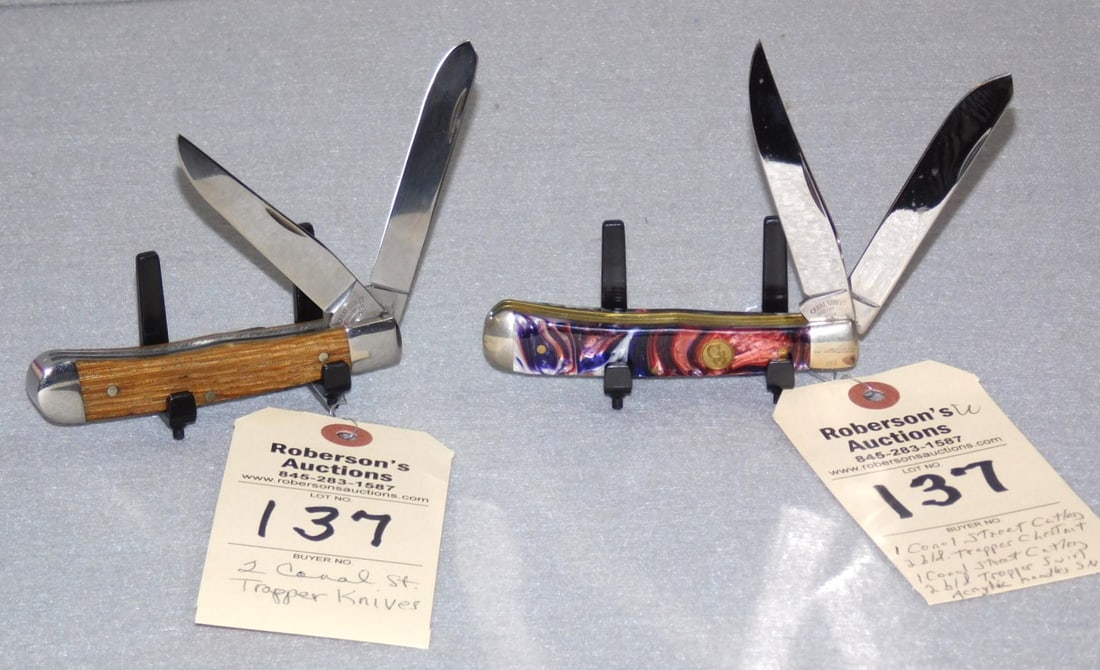 2 Canal Street Trapper Knives: 2 Canal Street Knives: 1 - 2 Blade Trapper, 4 1/4" w/Chestnut Handles; 1 - 2 Blade Trapper, 4 1/4" w/ Swirl Acrylic Handles, Ser. #01, VG Condition