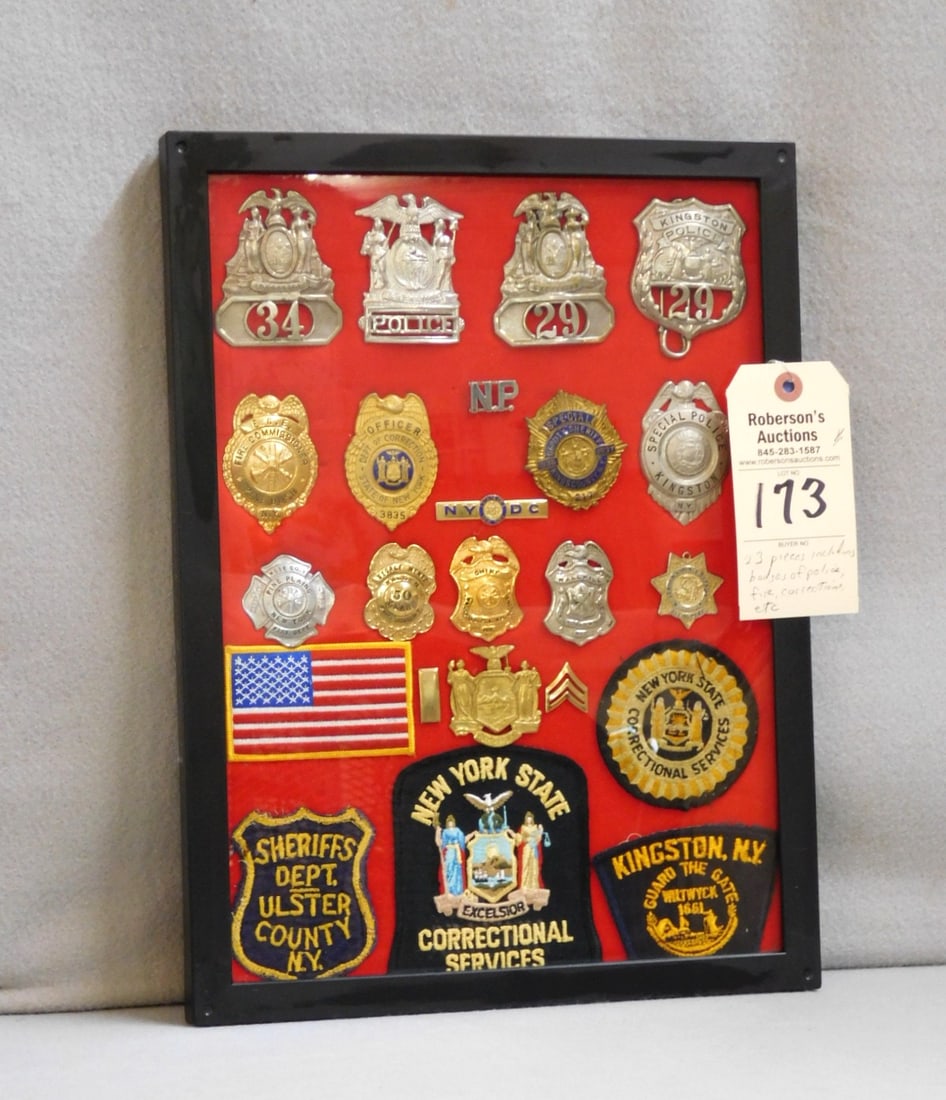 Collection of 23 Pcs. Including Badges: Collection of 23 Pcs. Including Badges of Police, Fire & Corrections, etc., Case 12 x 16 x 1", VG Cond.