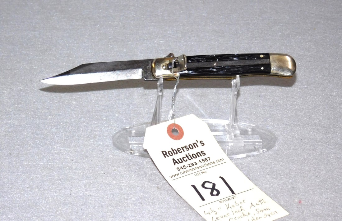 Ka-bar Lever Lock Automatic Knife: Ka-bar Lever Lock Automatic Knife, 4 1/2", Black Plastic Handles, No Cracks, Fires Well, Some Wobble, Very Gd. Condition