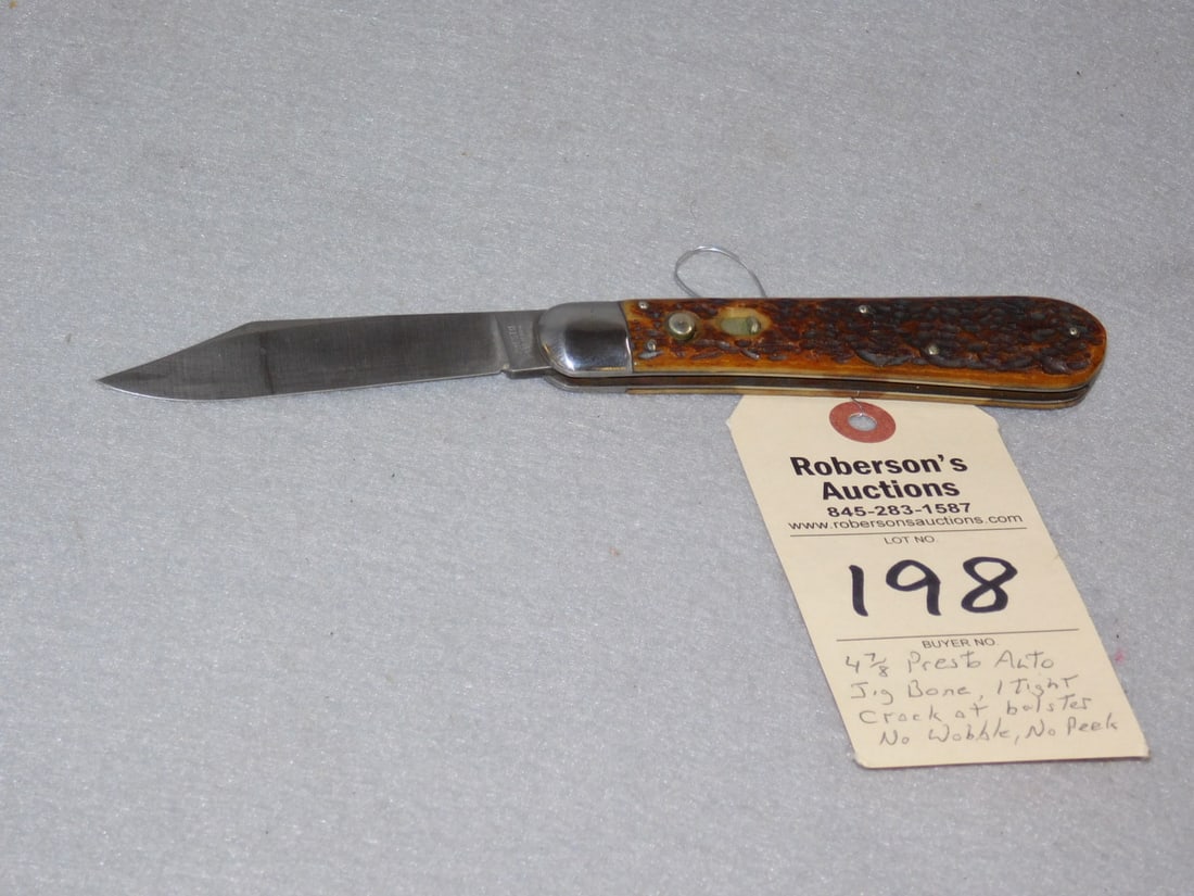 Presto Automatic Knife: Presto Automatic Knife, 4 7/8", Jig Bone Handles, One (1) tight pin crack on pile side at bolster, fires well, no wobble, no peek in VG Cond.