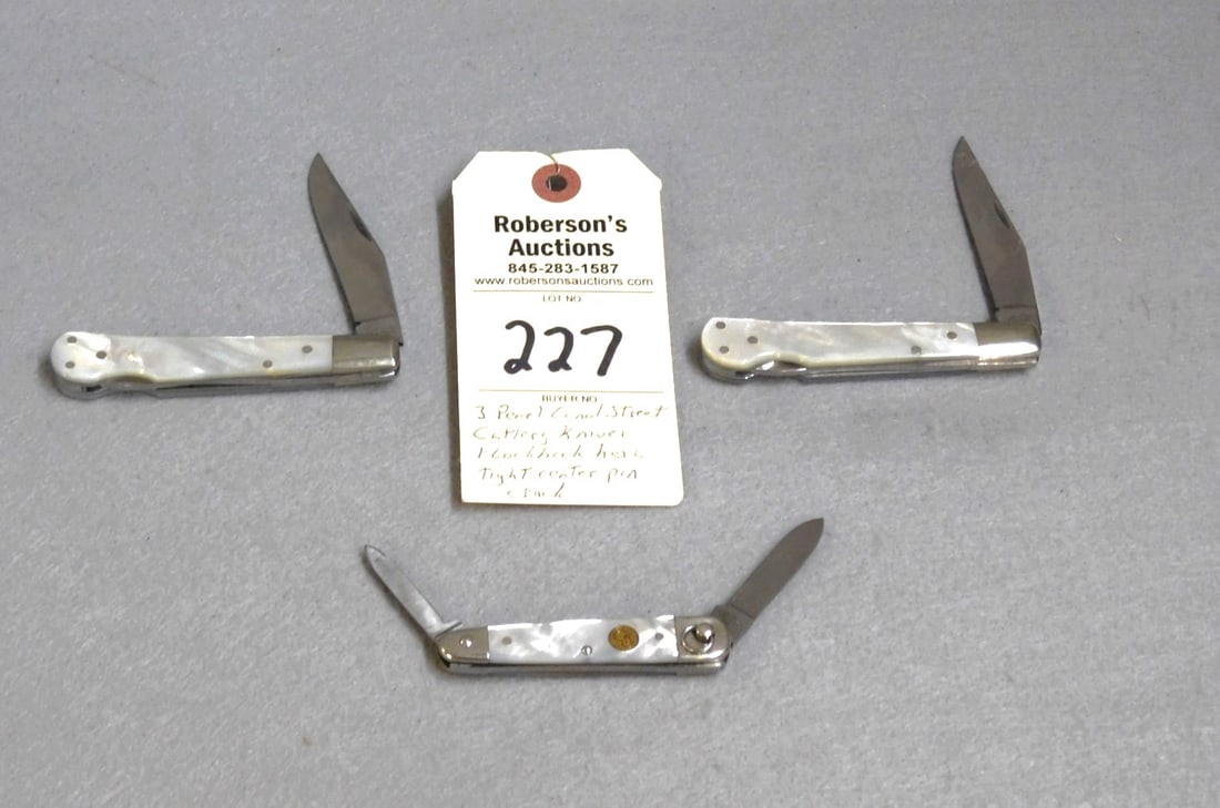 3 - Canal Street Cutlery Pearl Knives: 3 - Canal Street Cutlery Pearl Knives: 1) Ring Turn Knife, No Cracks - 3" 1)2 Pinch Lockback Knives - 3 3/4", One Has A Hint of a Crack At Center Pin in GD Cond.