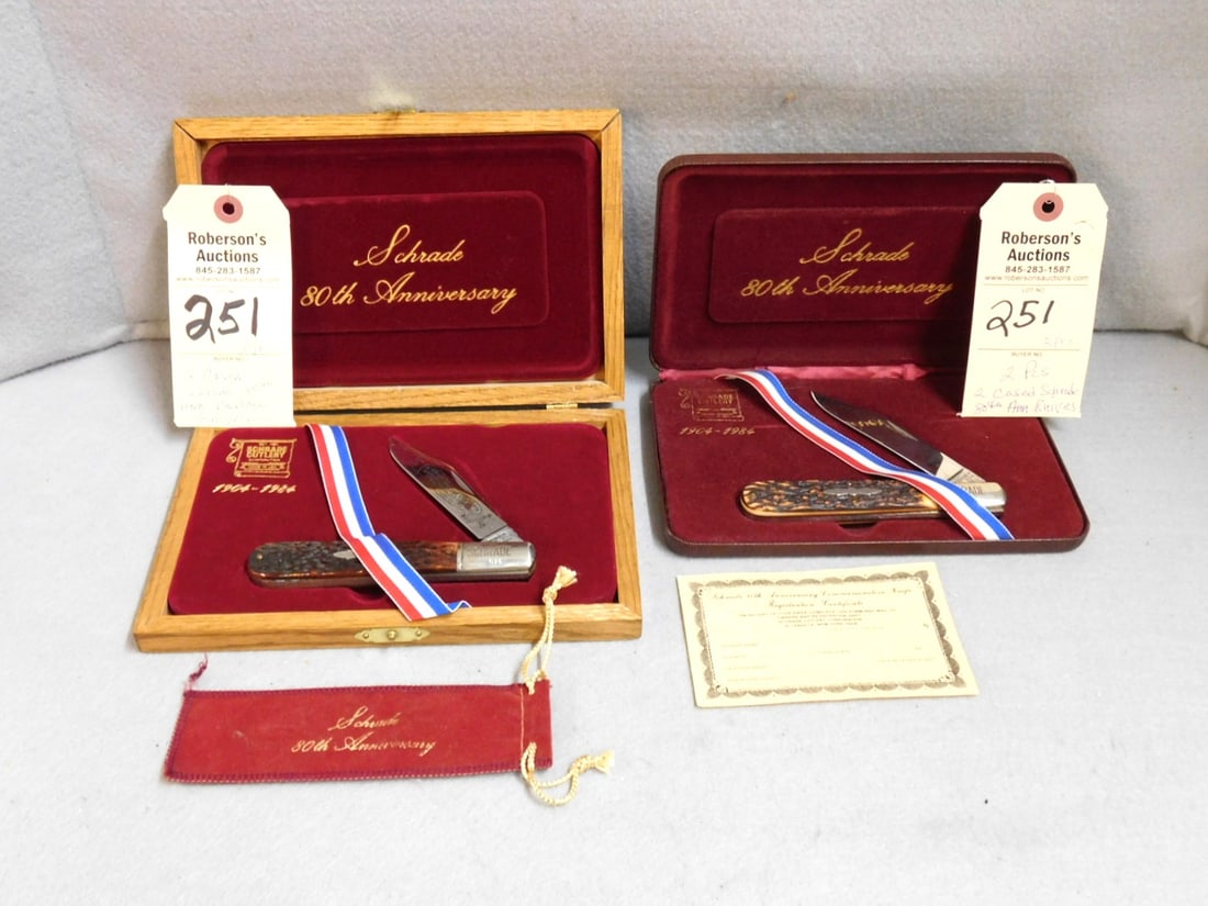 2 - Schrade 80th Ann.Barlow Knives: 2 - Cased Schrade 80th Anniversary Barlow Knives: 1) Deluxe w/ Bone Handle & Etched Blade; 1) Reg. w/ Delrin Handles, Both in GD Cond. - Case 5" x 8" x 3 3/4"H; Case - 6" x 8 3/4" x 3/4"W w/Box (Hinge