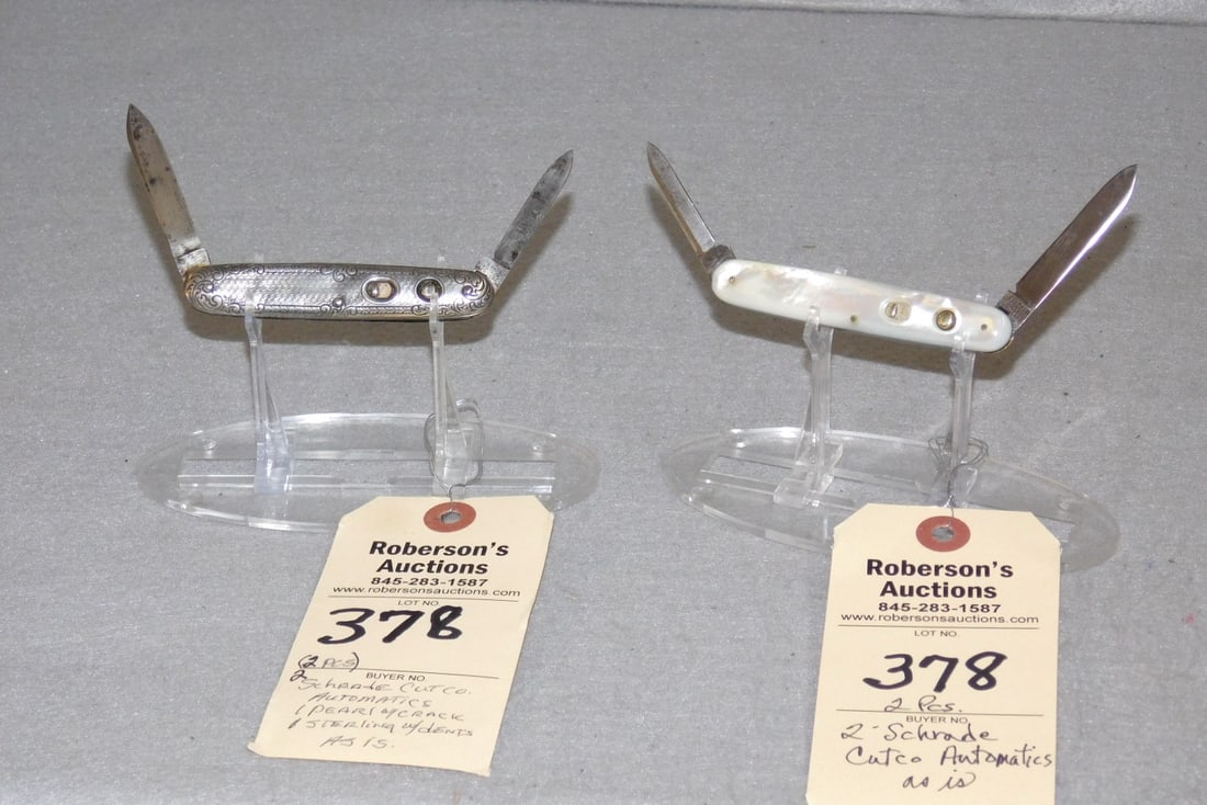 2 - Schrade Cutco Automatic Knives: 2 - Schrade Cutco Automatic Double Blade Knives: 1) Mother of Pearl Pc. w/Crack; 1) Etched Sterling Pc.w/Dents; Both 3 1/4" (AS IS)