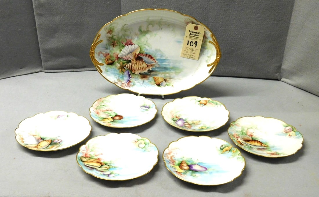 9 Pc. Fish "Sea Shell" Set by F.E. Towle: 9 Pc. Fish Set by F.E. Towle-Limoge France in VG Cond. -"Sea Shell" Pattern w/ Gold Rims.- Platter 17" L.; Plates 8 1/2"D.