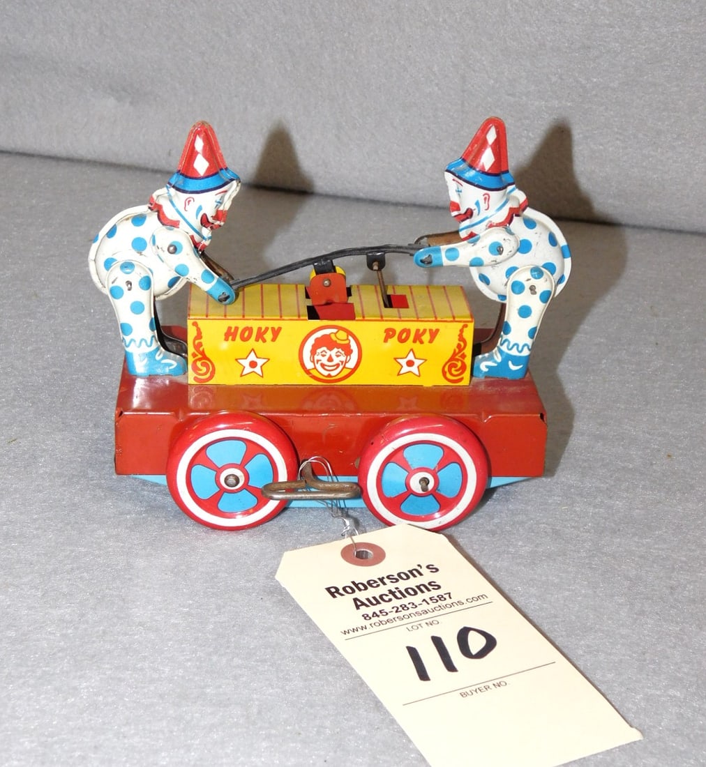Vintage Windup Hoky-Poky Toy: Vintage Windup Hoky-Poky Toy-2 Clowns Pumping to Move the Wagon along-Working GD Cond. 6 1/2"W x 5 1/2"H x 4 1/4"D.