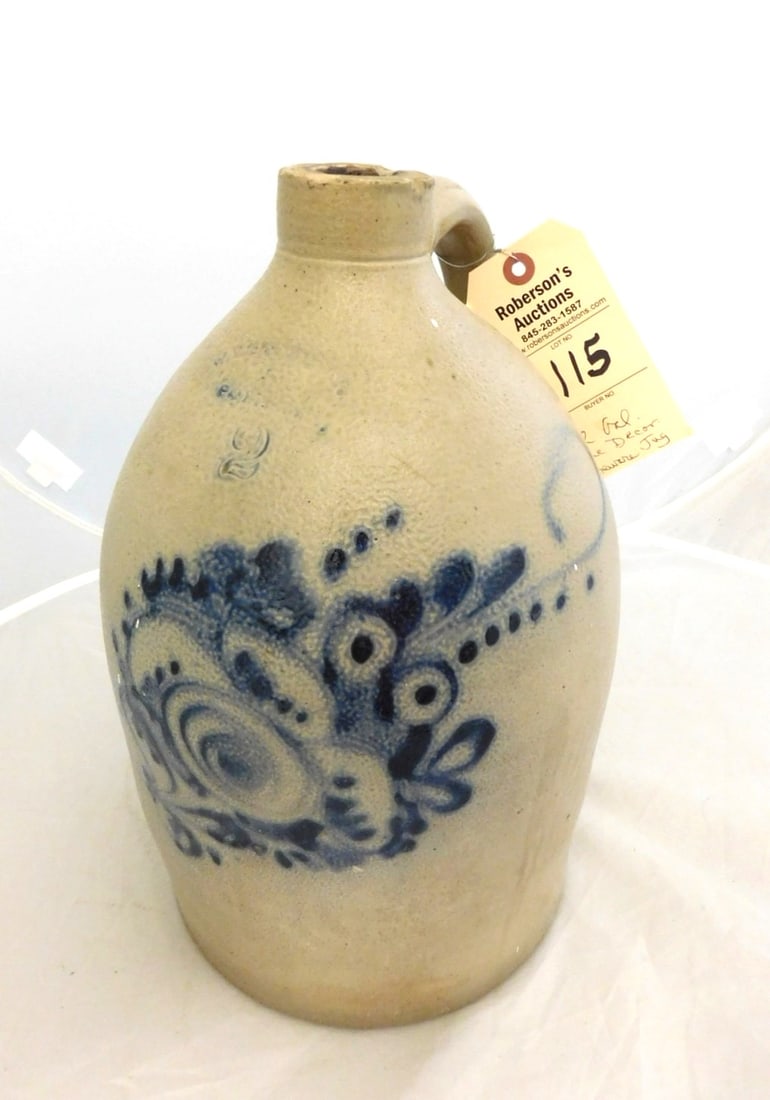 2 Gal. Decorated Stoneware Jug: 2 Gal. Decorated Stoneware Jug Marked but, Illegible w/ Blue Floral Decor. (Some Rim Chips) (Spiderline) in GD Cond. 14"H