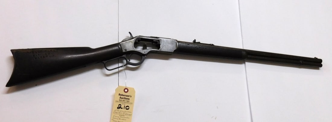 1873 Winchester Carb. 38 Cal.: 1873 Winchester Carb. 38 Cal., Serial #385036B, Firing Mechanism Missing, Stock has carving "Well's Fargo Exp. Co. Fargo N.D." 43"L x 5" W x 1-1/2" D