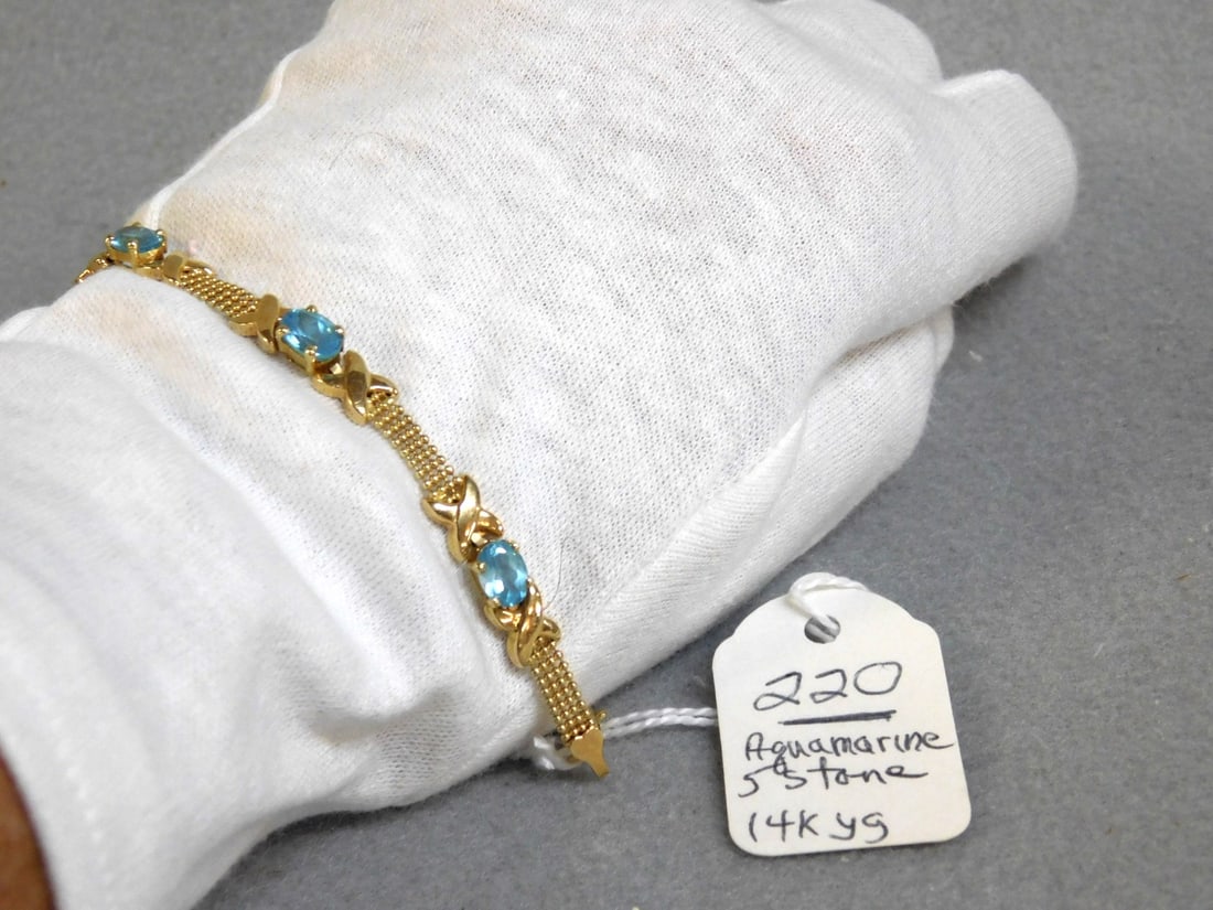 14K yg 5-Stone Aquamarine Bracelet: 14K yg 5-Stone Aquamarine Bracelet - Hugs & Kisses pattern in VG. Cond.