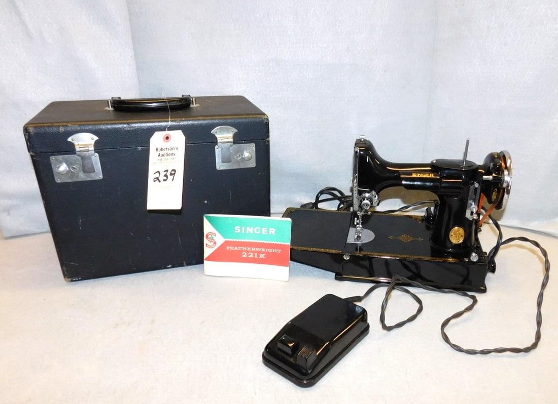 Singer Featherweight 221K Sewing Machine: Singer Featherweight 221K Sewing Machine w/ pedal, attachments, bobbbins, etc. & booklet, Model #087094 In VG. Cond. 20-1/2 H x 22 W x 13-3/4" D