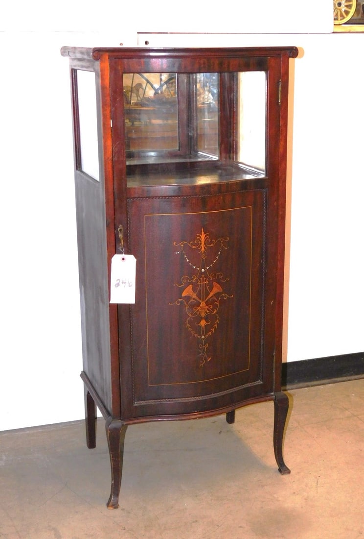 Mahogany Music Stand: Mahogany Music Stand w/Glass Mirror Curio Top, Has Musical Inlay on Door. - 47"H x 21"W x 14"D