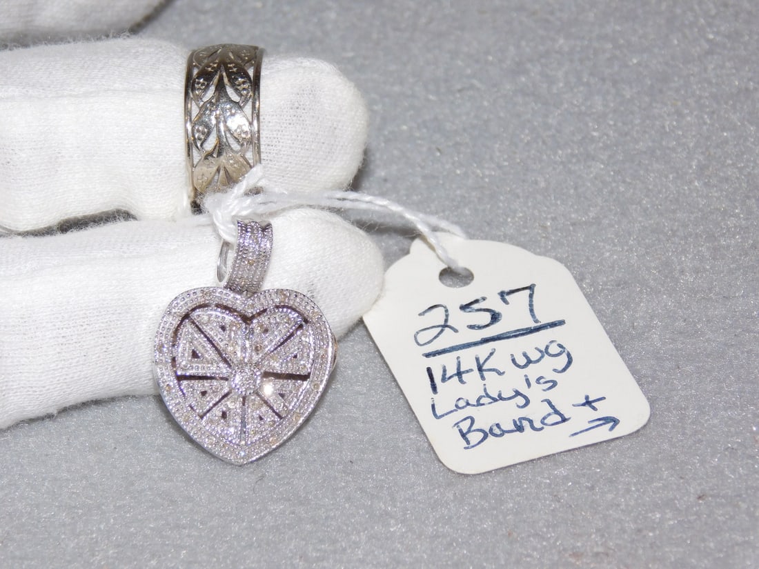 2 Pcs. 14K wg Jewelry Pendant & Ring: 2 Pcs. 14K wg Jewelry ncl. Diamond 14K wg Heart Locket Pendant & 14K wg filigree Lady's Band in VG Cond. Ring Sz. 6 Heart, 7.1 dwt
