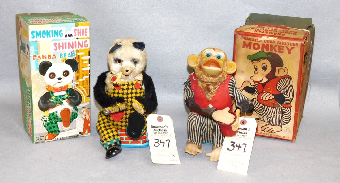 Lot of 2 Battery Operated Toys: Lot of 2 Battery Operated Toys incl. Working "Smoking & Shoe Shining Panda Bear & a Lot of 2 Battery Operated ToysCrap Shooting Monkey, Not Working in Gd. Cond, - Cases: 10x6x5 1/2' ; 10x5x5 1/2"
