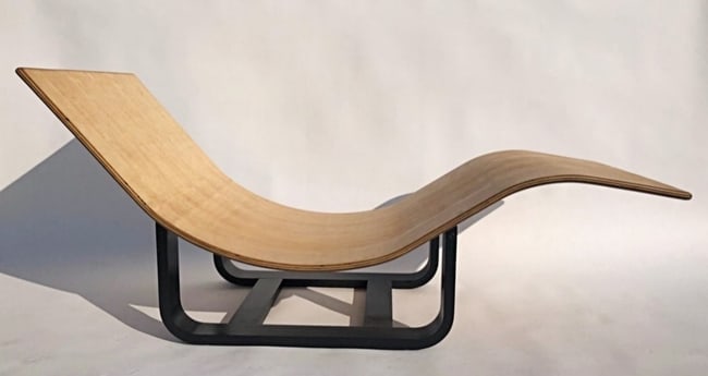 Danish Modern Bentwood Chaise Lounge: Danish Modern Bentwood Chaise Lounge that adjusts to provide an 'antigravity' feel when fully reclined. The chaise is in two parts, a bentwood base in a black finish, that supports a blond finish bent