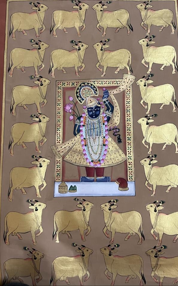 PICHWAI SCHOOL – SHREENATHJI WITH SACRED COWS – OIL ON CLOTH – C.1970s: PICHWAI SCHOOL – SHREENATHJI WITH SACRED COWS – OIL ON CLOTH – C.1970s A TRADITIONAL PICHWAI SCHOOL PAINTING DEPICTING SHREENATHJI (KRISHNA) STANDING WITHIN AN ORNAMENTAL ARCH, SURROUNDED BY A