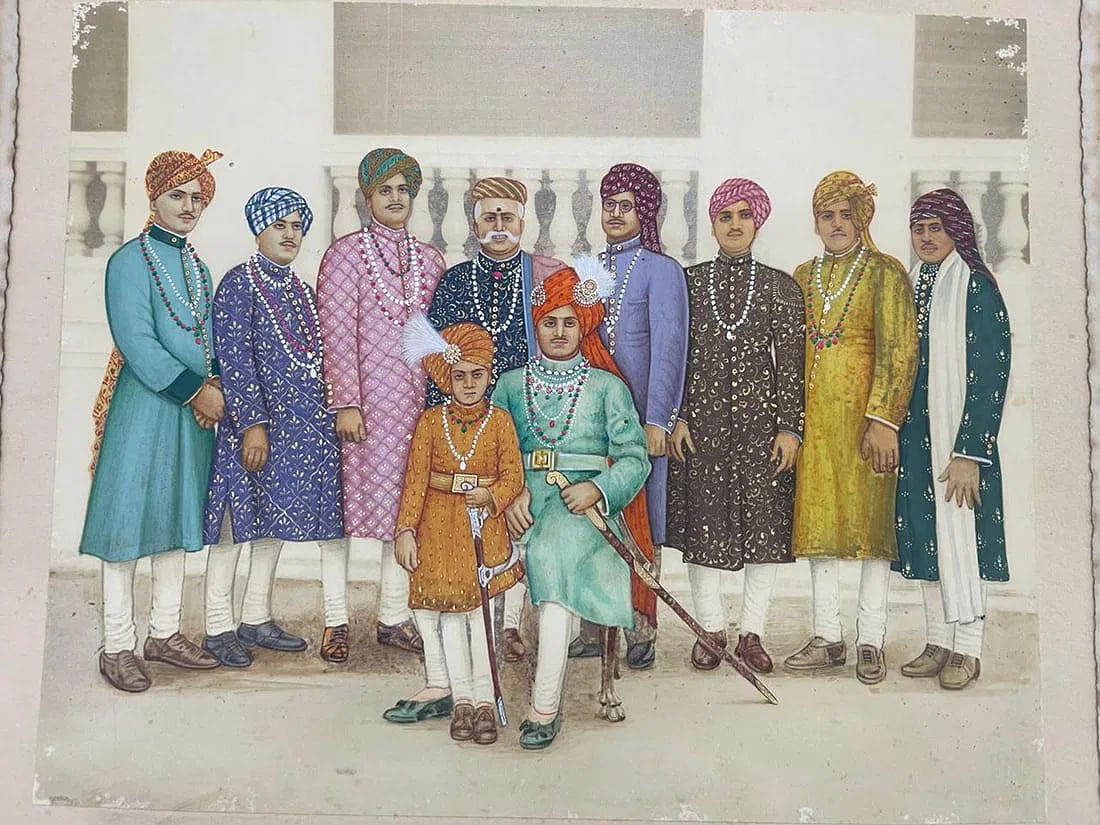 OYAL PORTRAIT OF INDIAN NOBLEMEN — HAND-COLOURED BROMIDE PHOTOGRAPH: OYAL PORTRAIT OF INDIAN NOBLEMEN — HAND-COLOURED BROMIDE PHOTOGRAPHTHIS ARTWORK IS A HAND-COLOURED BROMIDE PHOTOGRAPH DEPICTING A FORMAL GROUP PORTRAIT OF INDIAN NOBLEMEN OR ROYAL COURTIERS FROM