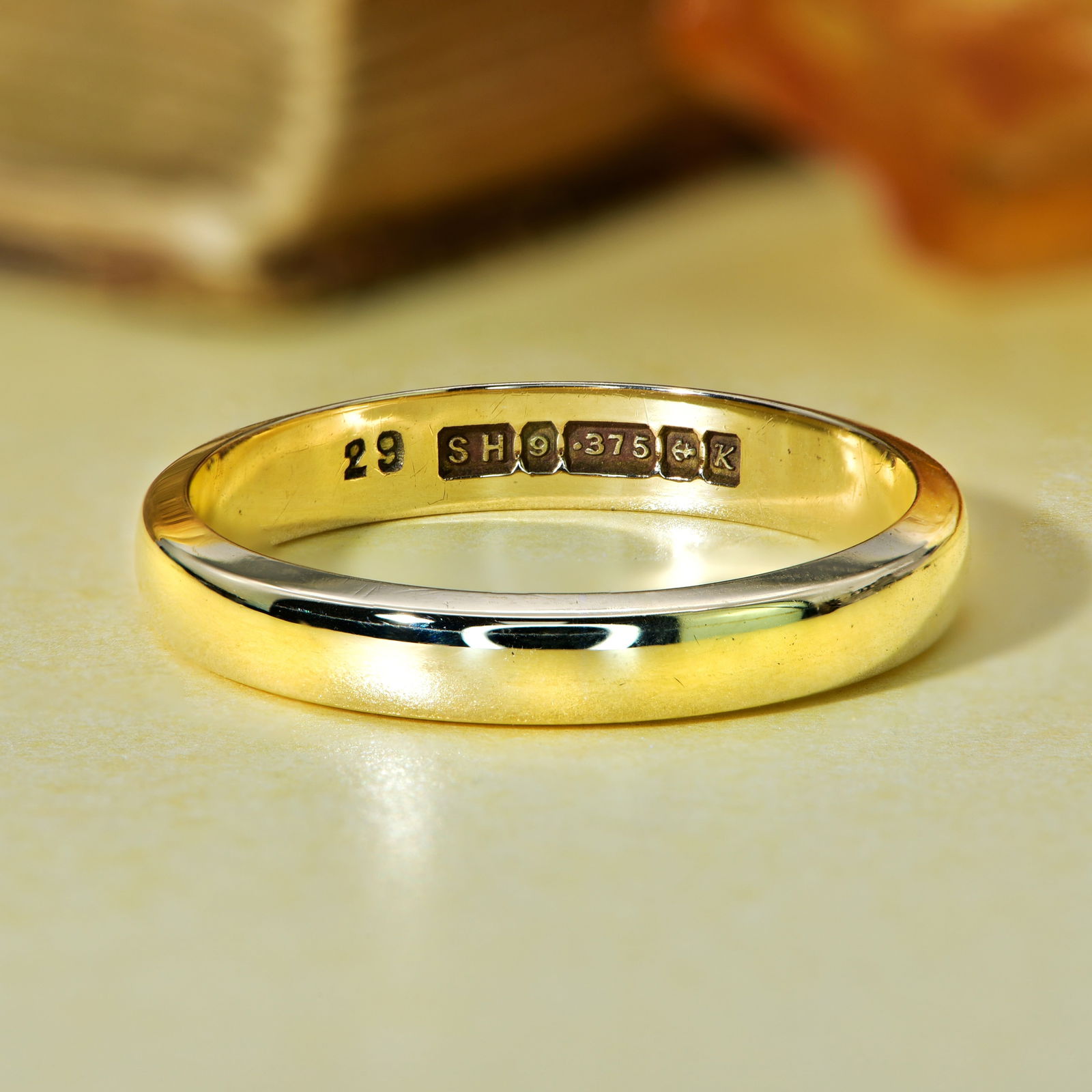 Vintage 9ct 1984 Wedding Ring: Vintage 9ct 1984 Wedding Ring This yellow gold wedding ring is fully hallmarked by the Assay Office of Birmingham for 9ct gold in 1984. Good wearable condition, usual light marks commensurate wi