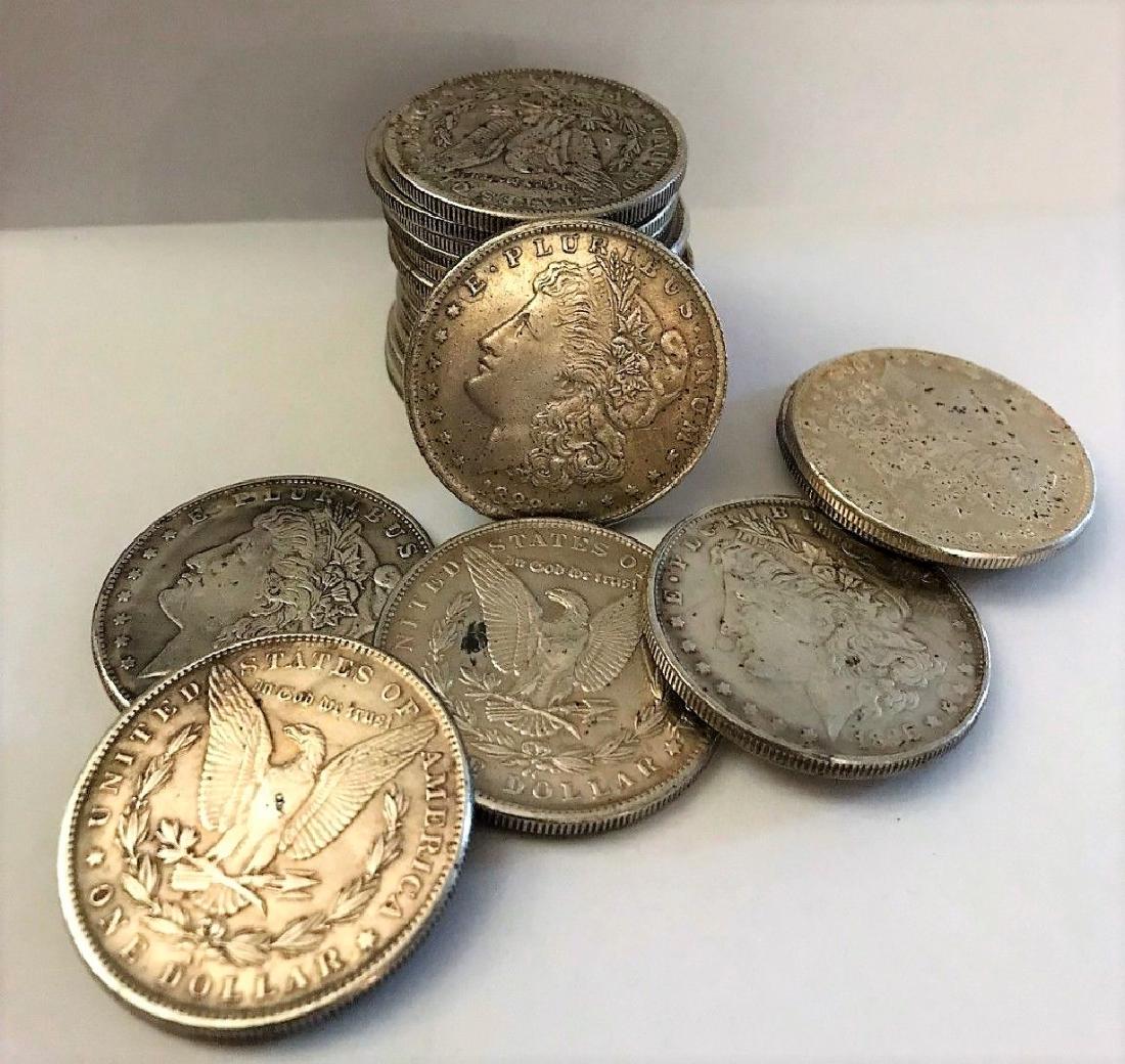 Roll of Morgan Silver Dollars Mixed Grades: Item is as shown in image. Bidder is responsible for all value and grade determination based upon image. All bids constitute a binding contract and agreement to pay.