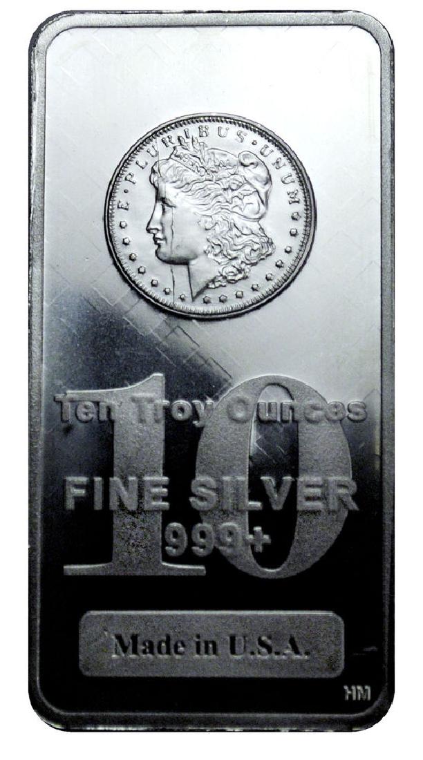 10 oz. Silver Bar - Morgan Design -.999 Pure: Item is as shown in image. Bidder is responsible for all value and grade determination based upon image. All bids constitute abinding contract and agreement to pay.
