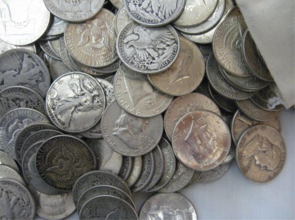 Lot of 50 90% Silver Half Dollars: A lot of 50 Silver Half Dollars- Various dates and mints. 90% Silver
