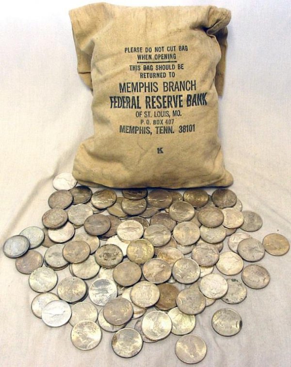 Lot of 25 Peace Silver Dollars: A large lot of Peace Silver Dollars- 25 items g-au- grades.