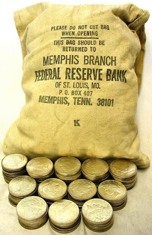 Lot of 61 Peace SIlver Dollars: A lot with 61 Peace Silver Dollars- Assorted Grades And Dates- g-au