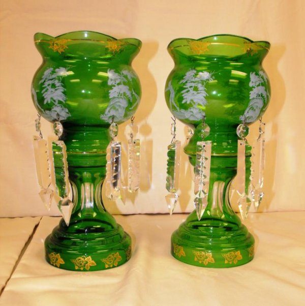 Emerald Green Mary Gregory Style Lusters: A pair of M G style lusters with crystal drops and gilt accents. 10" tall.