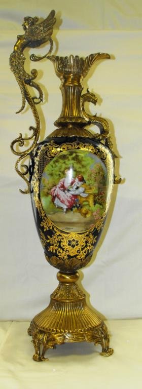 Monumental 30" Dore Bronze Figural Ewer: A very nice romantic scene porcelain insert ewer. Having dore bronze mounts and figural handle.