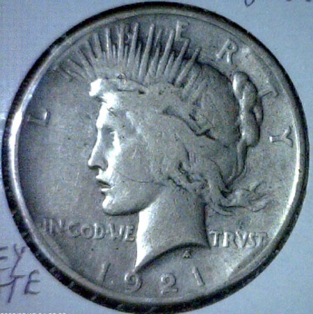 1921 Circulated- Peace Silver Dollar: A high relief Peace silver dollar- Please review the bidding and payment procedure. Your bid is a contract and promise to pay w
