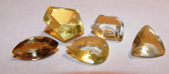 22.5 ct. Citrine Gemstone Parcel: All of our evaluations use some or all of the following Gemological tools. : A fully corrected triplet loupe, binocular microscope, master color comparison diamond set, electronic carat balancing scal