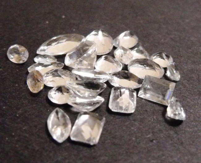 23 ct. White Topaz Gemstone Parcel: All of our evaluations use some or all of the following Gemological tools. : A fully corrected triplet loupe, binocular microscope, master color comparison diamond set, electronic carat balancing scal