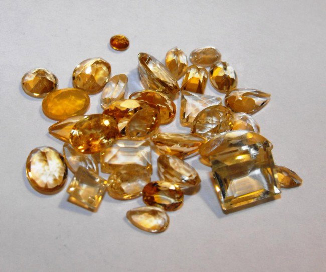 31.5 ct. Citrine Gemstone Parcel: All of our evaluations use some or all of the following Gemological tools. : A fully corrected triplet loupe, binocular microscope, master color comparison diamond set, electronic carat balancing scal