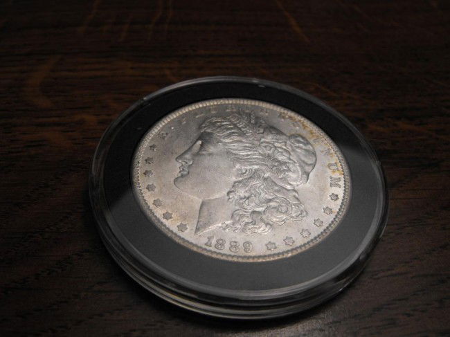 1889 P Morgan Silver Dollar: We offer at auction some of the best quality tangible assets. We strive to make your bidding experience the best on the net. Weekly sales of large bulk lots, individual lots and simply the most offeri