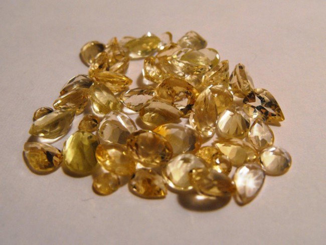 55 ct. Citrine Gemstone Parcel: All of our evaluations use some or all of the following Gemological tools. : A fully corrected triplet loupe, binocular microscope, master color comparison diamond set, electronic carat balancing scal