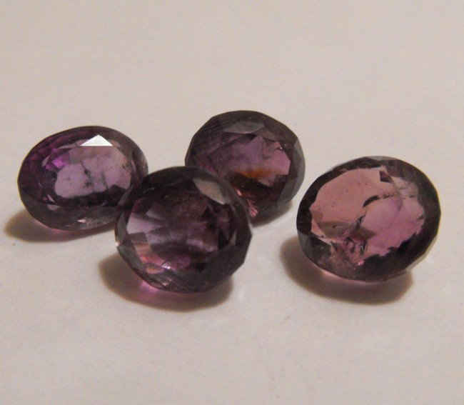27.5 ct. Amethyst Gemstone Parcel: All of our evaluations use some or all of the following Gemological tools. : A fully corrected triplet loupe, binocular microscope, master color comparison diamond set, electronic carat balancing scal