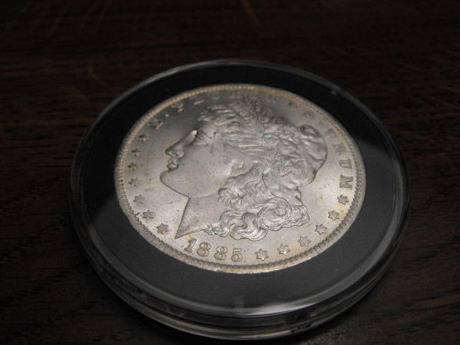 1885 O Morgan Silver Dollar: We offer at auction some of the best quality tangible assets. We strive to make your bidding experience the best on the net. Weekly sales of large bulk lots, individual lots and simply the most offeri