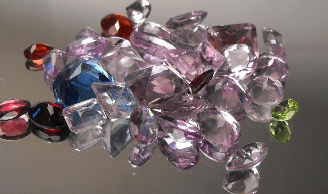 52 ct. Multi Gemstone Parcel: All of our evaluations use some or all of the following Gemological tools. : A fully corrected triplet loupe, binocular microscope, master color comparison diamond set, electronic carat balancing scal