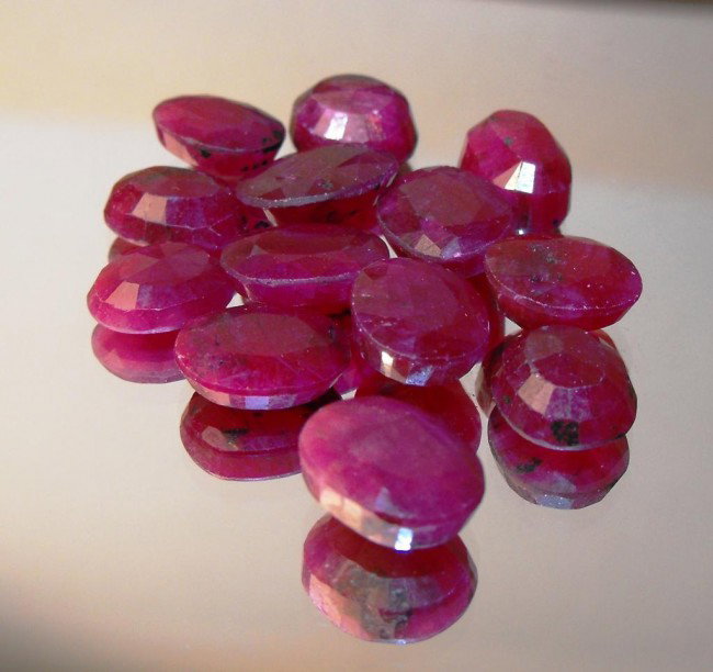 55 tcw Ruby Parcel - $ 4500 GG GIA: All of our evaluations use some or all of the following Gemological tools. : A fully corrected triplet loupe, binocular microscope, master color comparison diamond set, electronic carat balancing scal